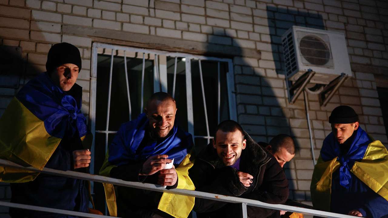 Ukrainian prisoners of war (POWs) return after a swap, in an undisclosed location