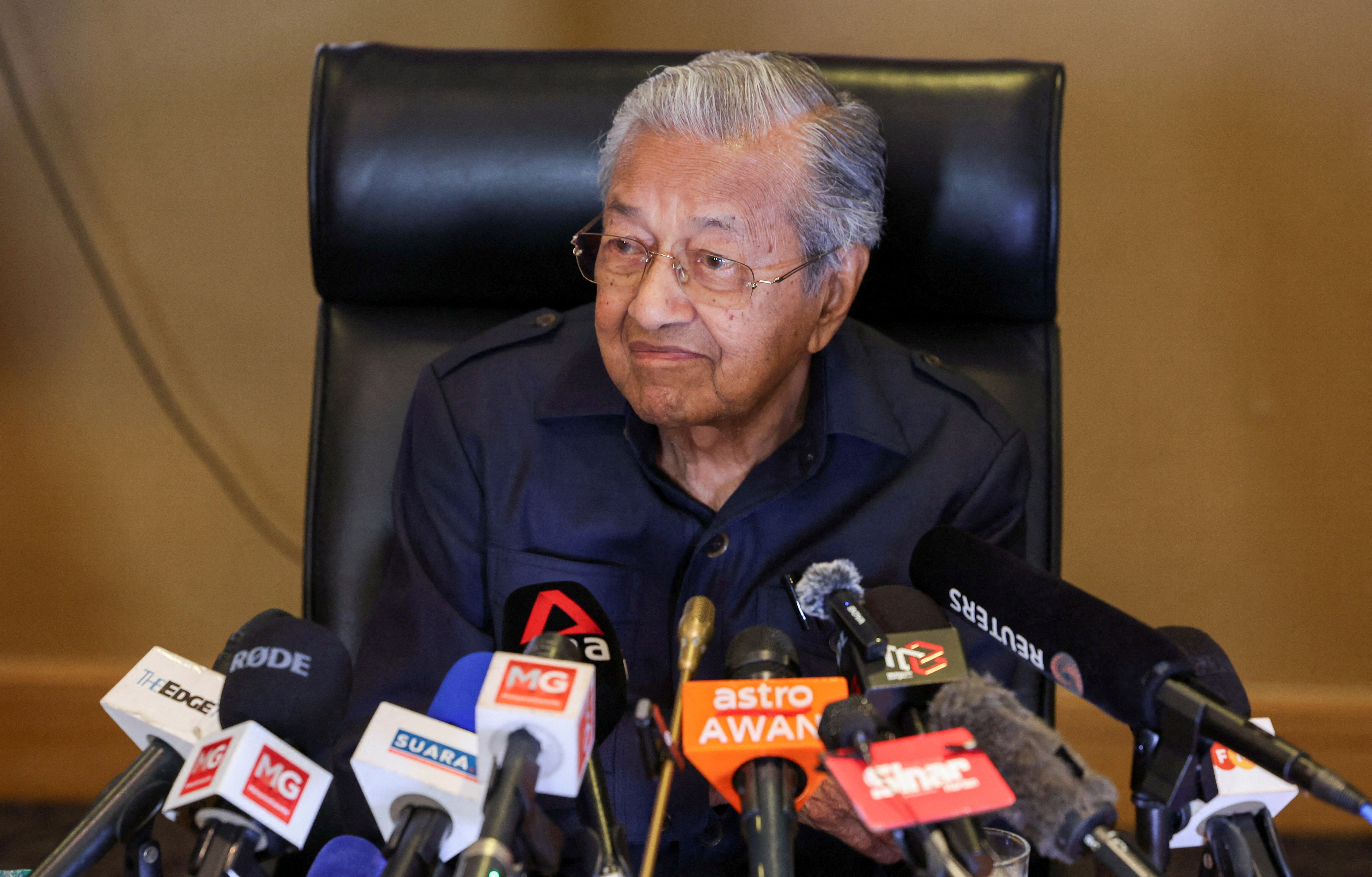 FILE PHOTO: Former Malaysian Prime Minister Mahathir Mohamad holds a press conference at Putrajaya