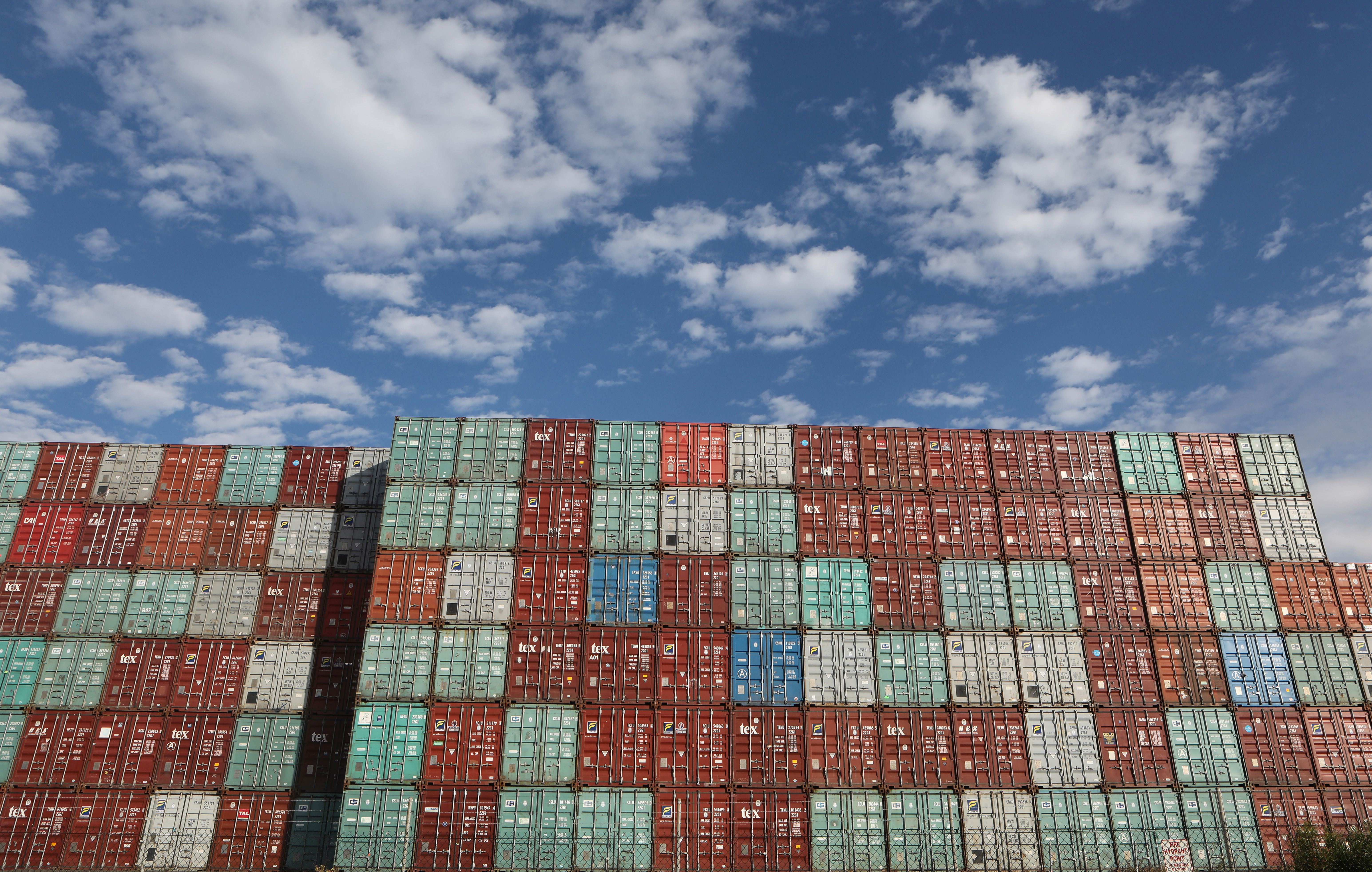 Containers are piled up at Port Botany facilities in Sydney