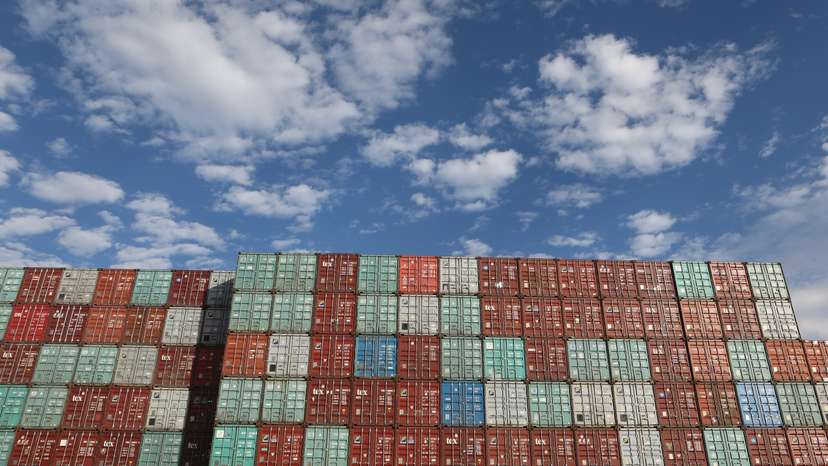 Containers are piled up at Port Botany facilities in Sydney
