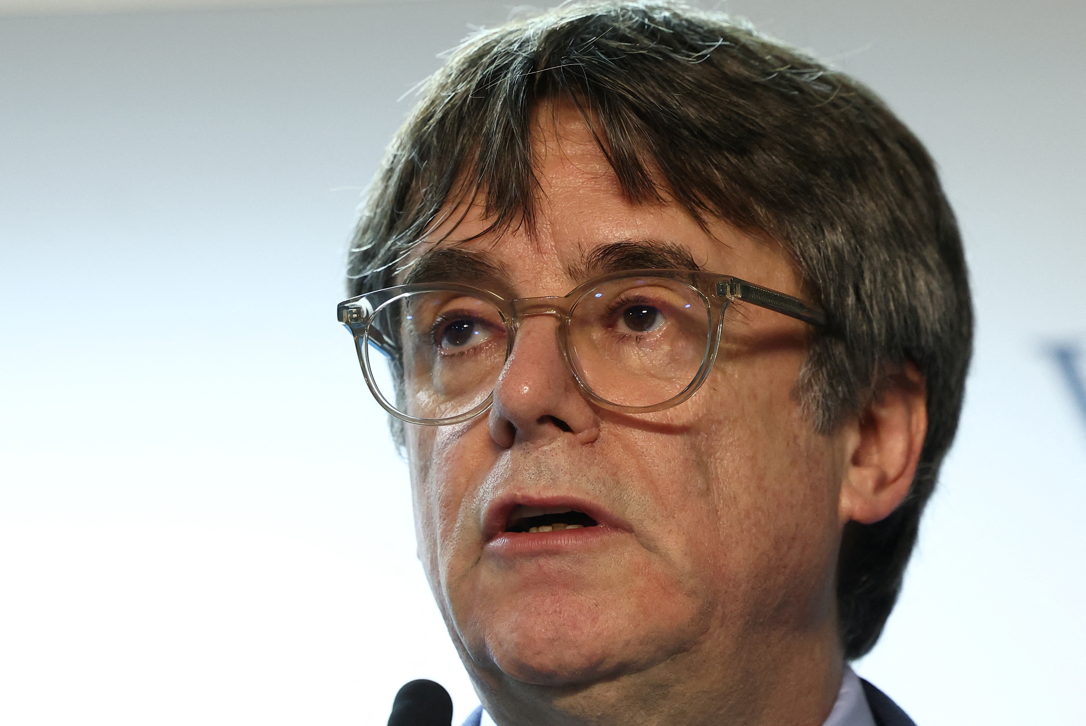 Spain's Socialist and Junts expected to confirm a deal to form government, in Brussels