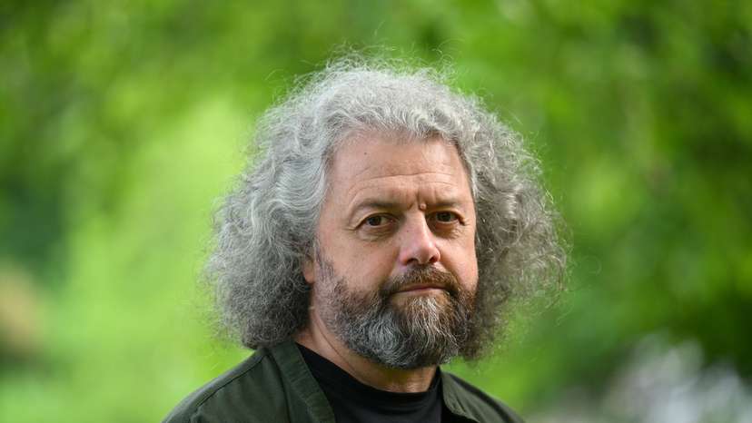 Belarusian poet and publisher Dmitri Strotsev poses for a photo in Berlin