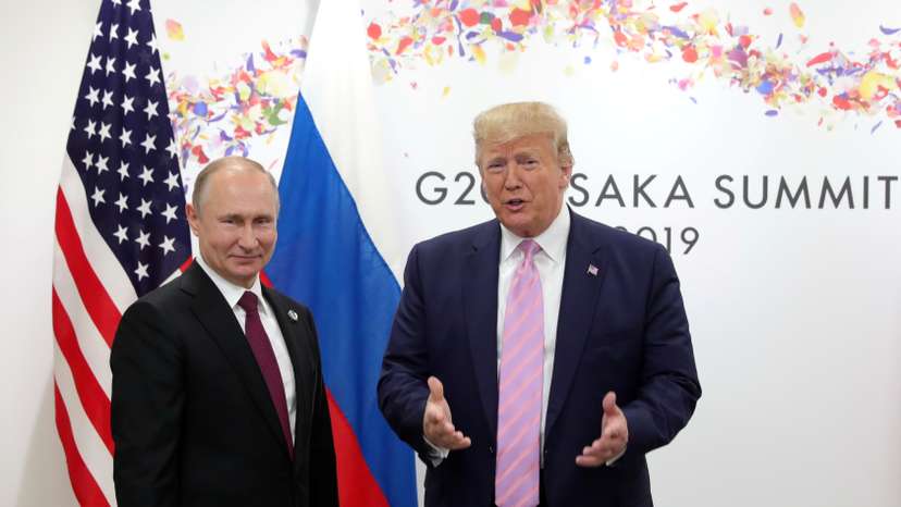 Russia's President Vladimir Putin and U.S. President Donald Trump attend a meeting on the sidelines of the G20 summit in Osaka