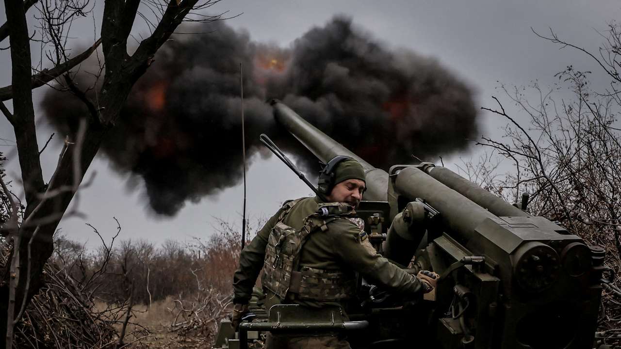 Ukrainian servicemen fire a self-propelled howitzer towards Russian troops at a front line near the town of Chasiv Yar
