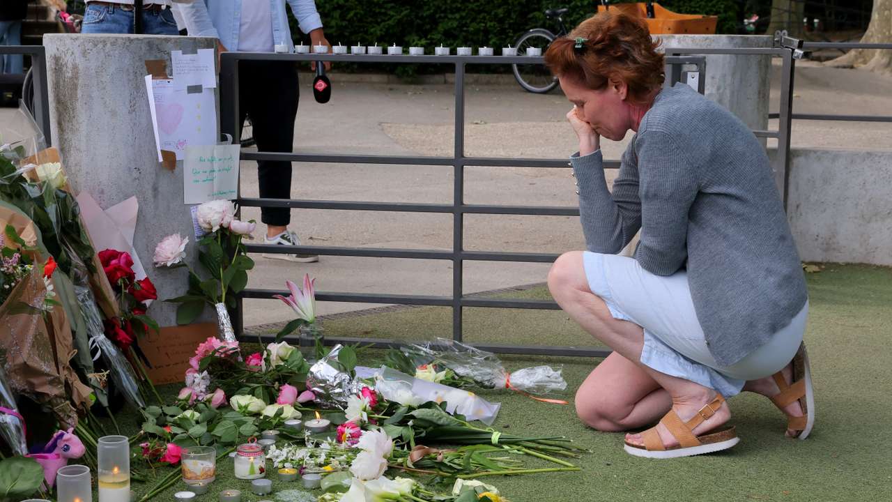 Tribute for victims the day after knife attack in French alpine town of Annecy