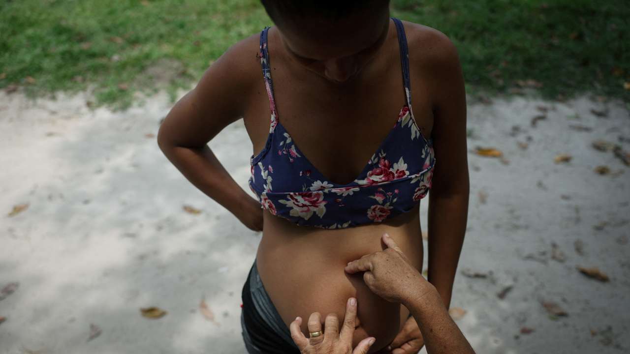 The Wider Image: In the remote Amazon, midwives care for women stranded by drought