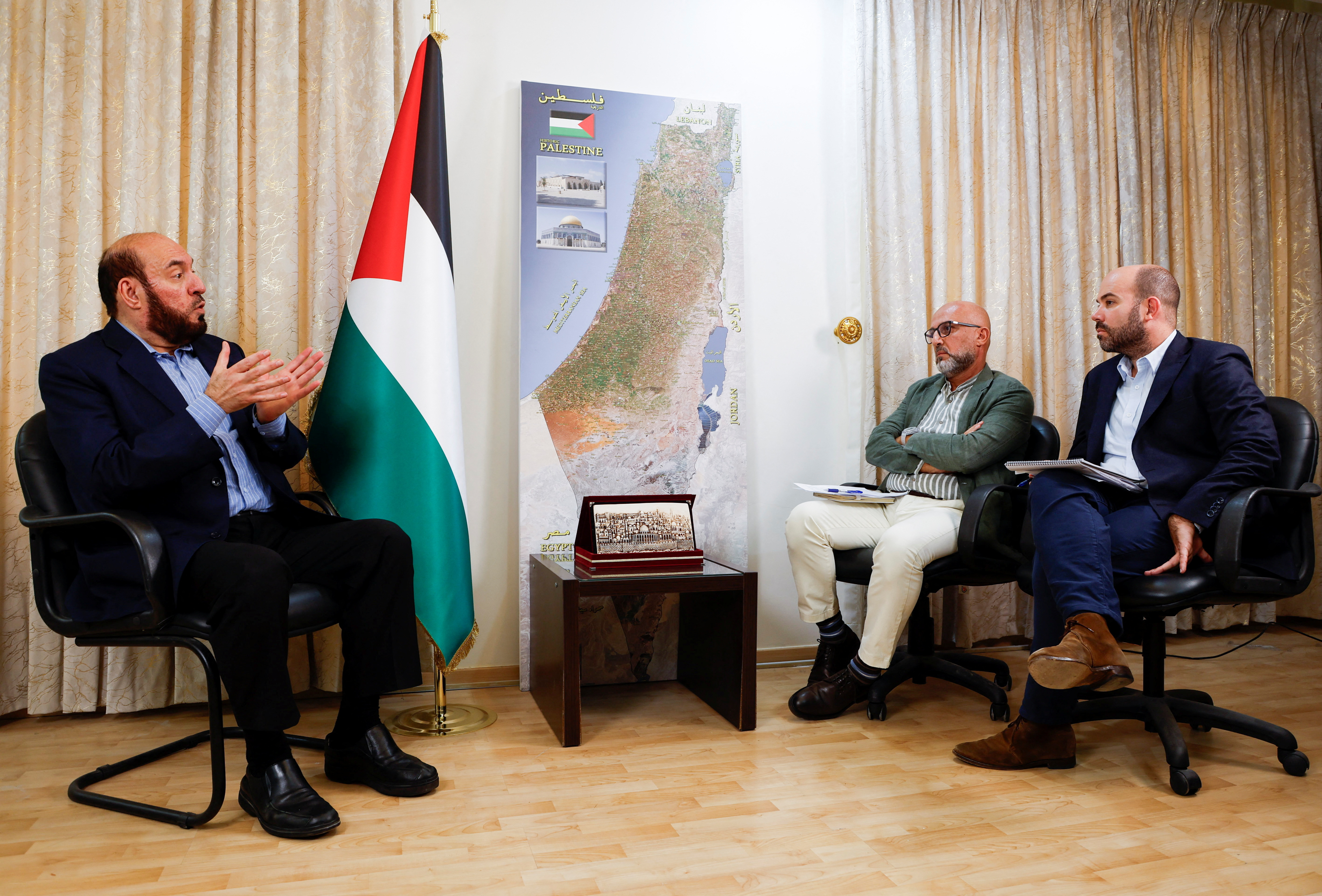 Hamas senior official Mohammed Nazzal speaks during an interview with Reuters, in Doha