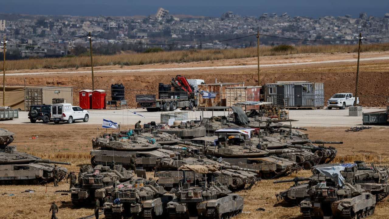 Israeli tanks are seen, near the Israel-Gaza border
