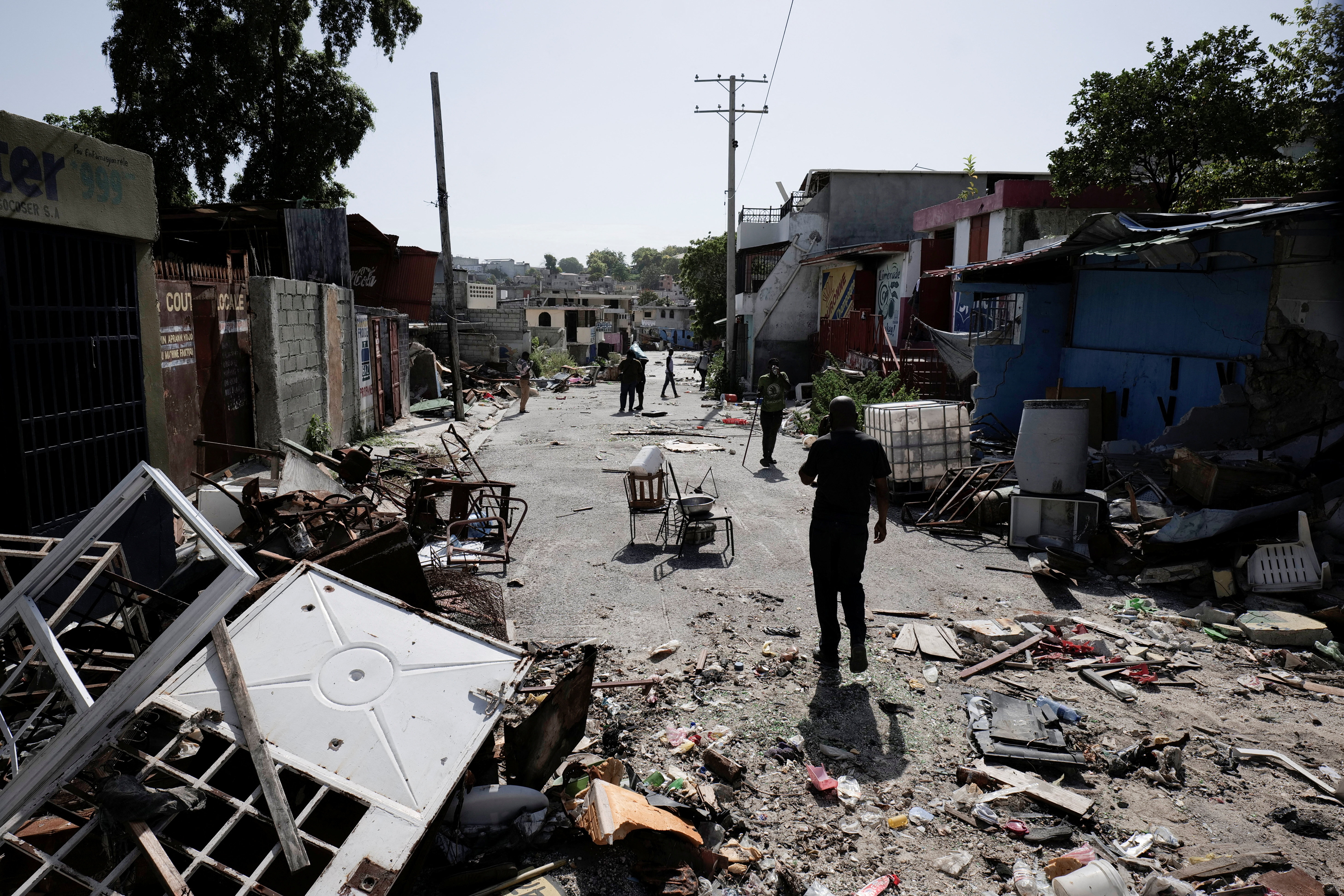 Haitian residents return to neighborhoods abandoned by gang, in Port-au-Prince