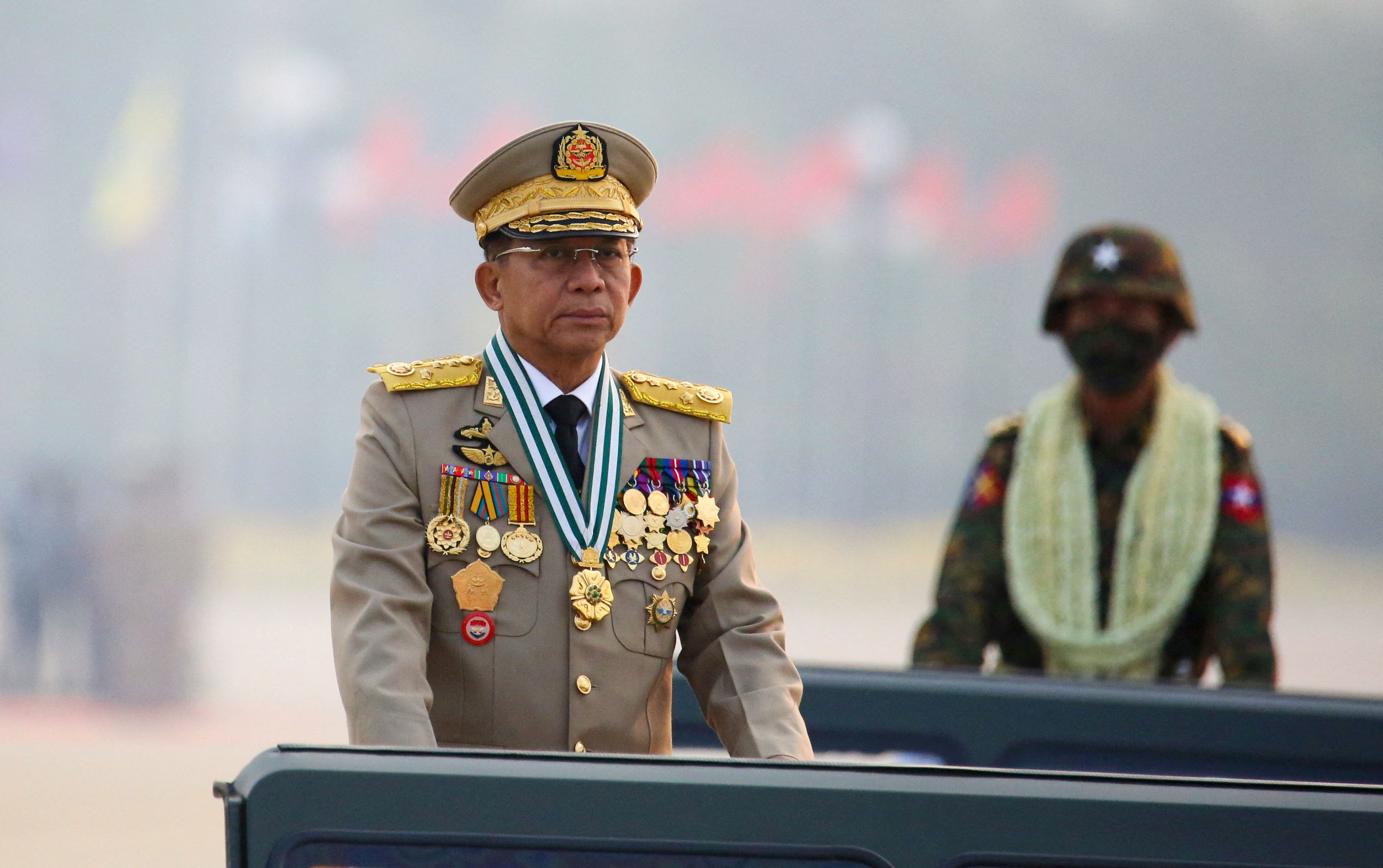Myanmar's junta chief Senior General Min Aung Hlaing presides an army parade on Armed Forces Day in Naypyitaw