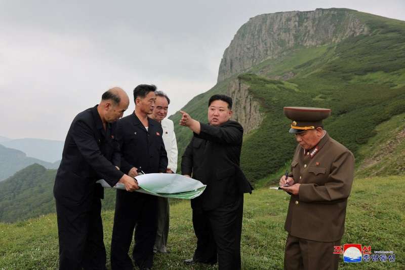 FILE PHOTO: North Korean leader Kim Jong Un guides the Samjiyon City construction project