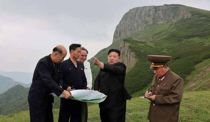 FILE PHOTO: North Korean leader Kim Jong Un guides the Samjiyon City construction project