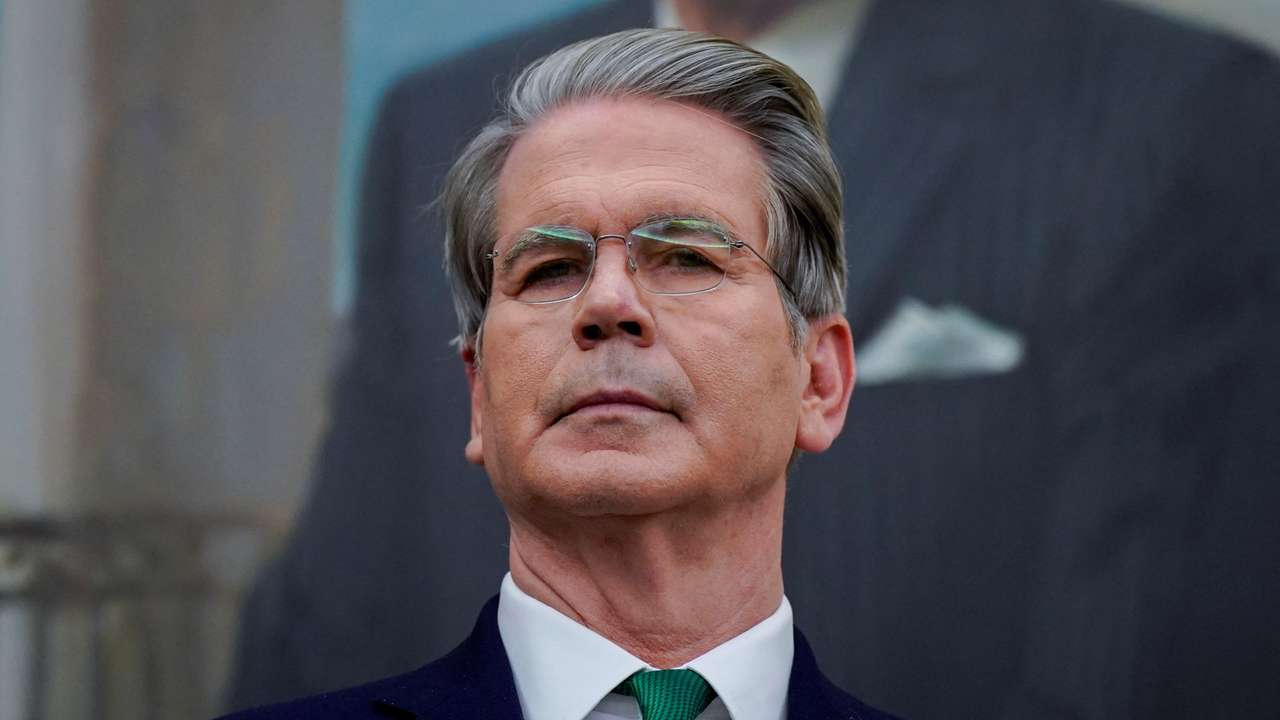 U.S. President Donald Trump signs an executive order in the Oval Office of the White House