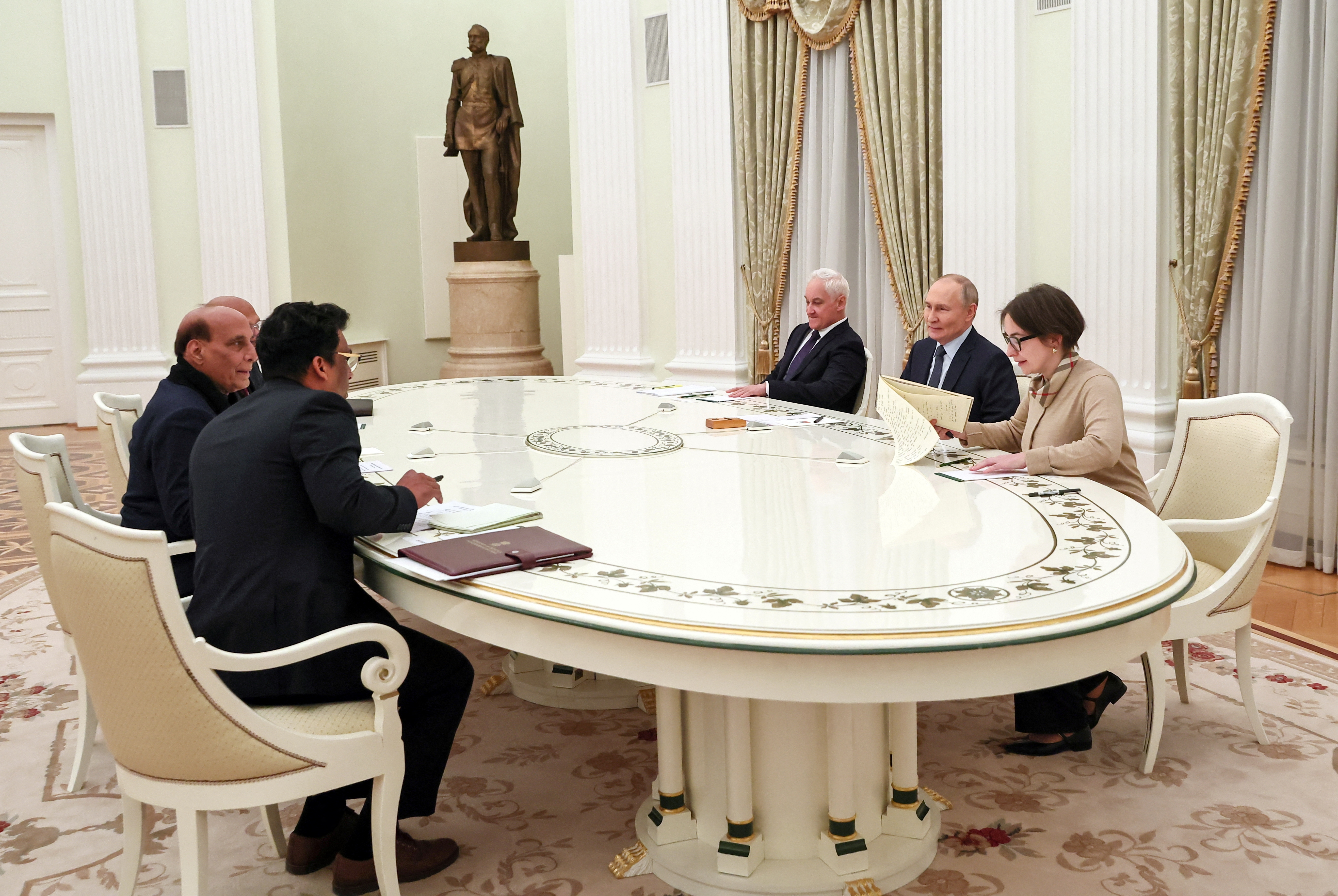 Russian President Putin meets Indian Defence Minister Singh in Moscow