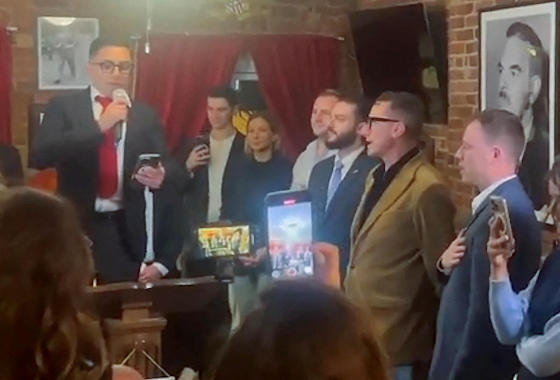 AfD members sing the tabooed version of the German national anthem in New York City