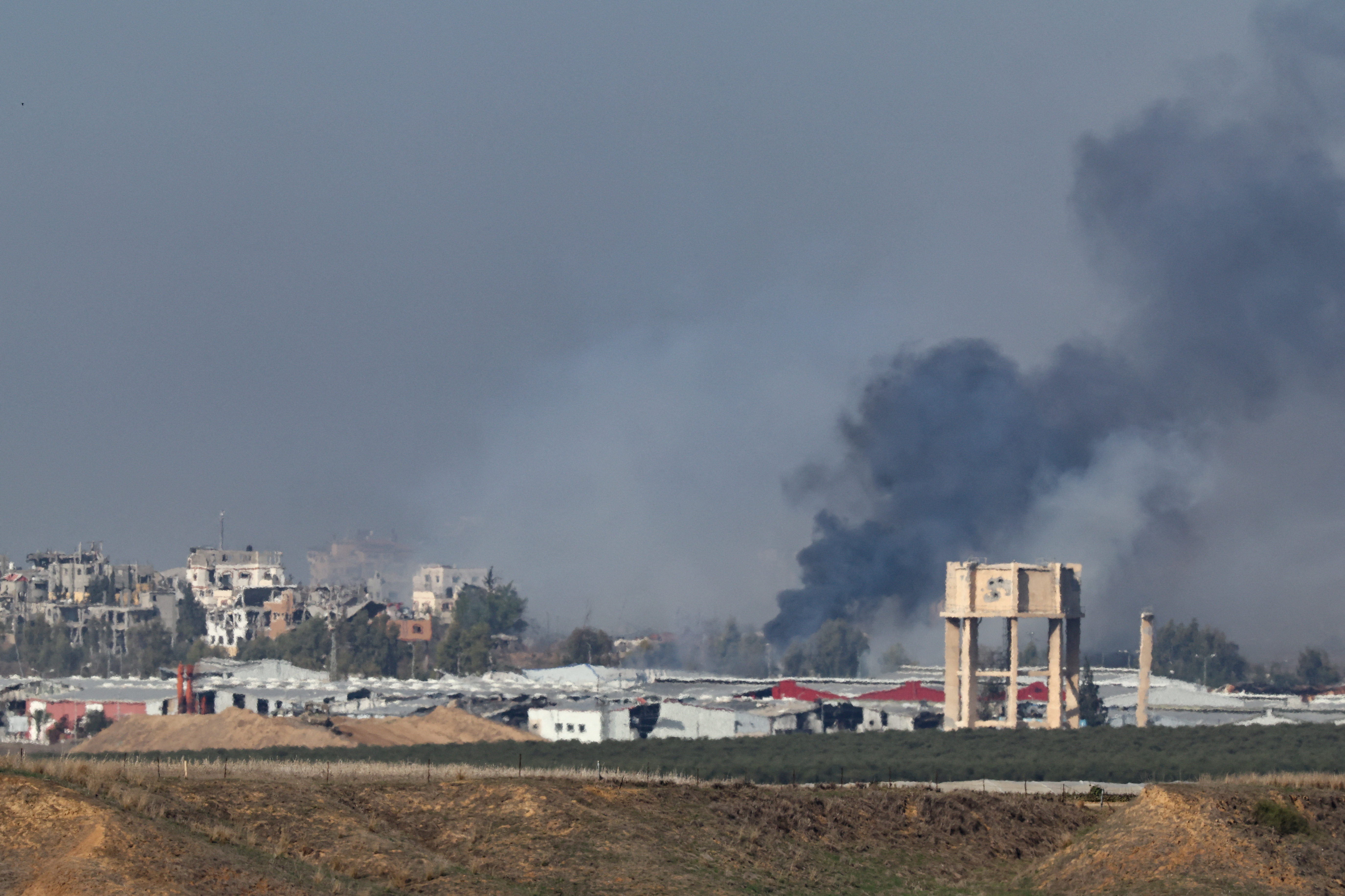Smoke rises above Gaza  as seen from southern Israel