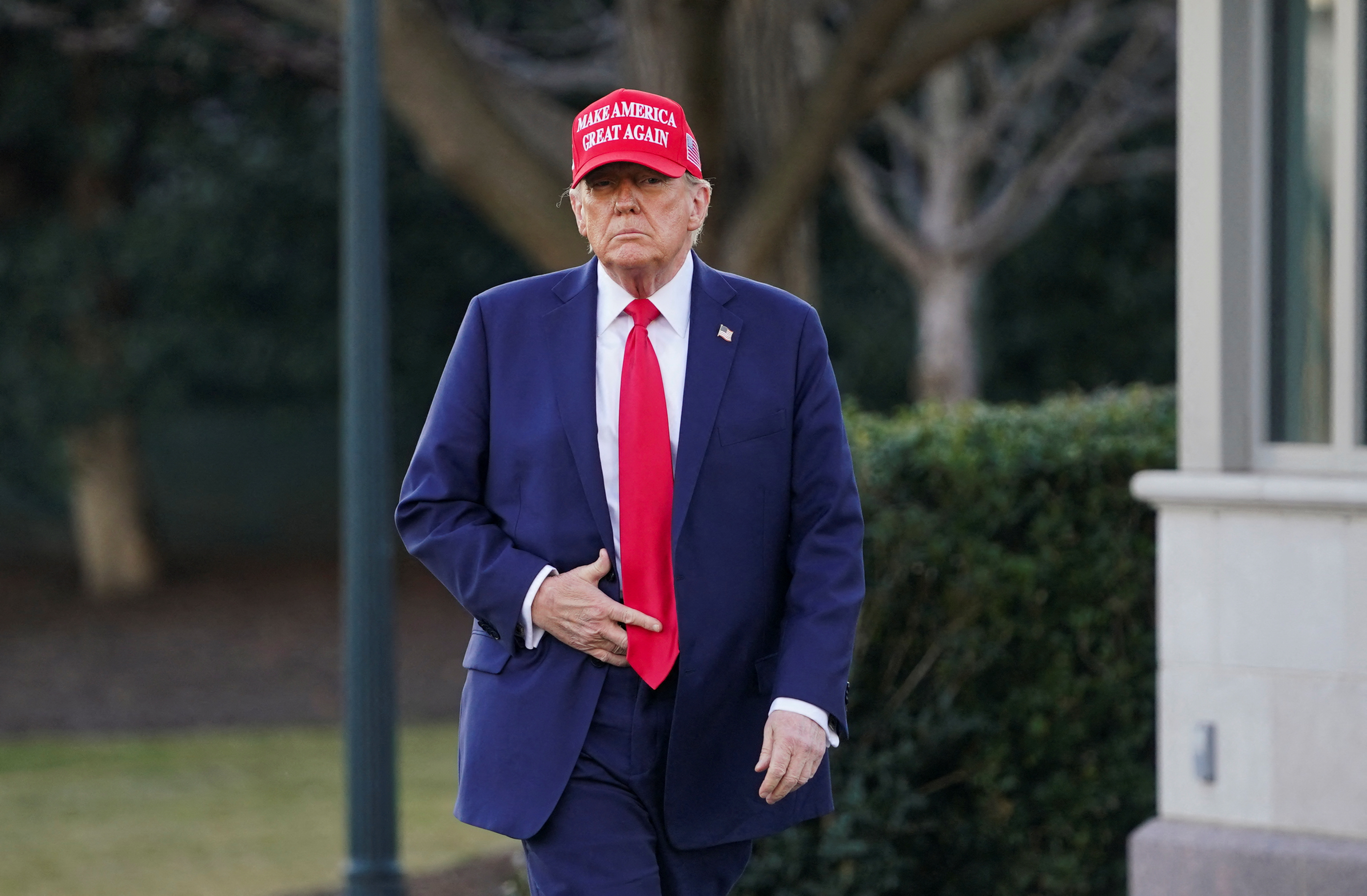 FILE PHOTO: U.S. President Donald Trump speaks with members of the media on the South Lawn before boarding Marine One at the White House