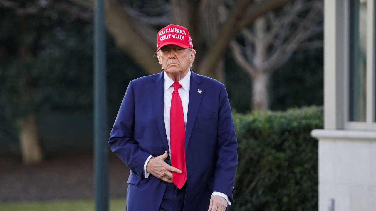 FILE PHOTO: U.S. President Donald Trump speaks with members of the media on the South Lawn before boarding Marine One at the White House
