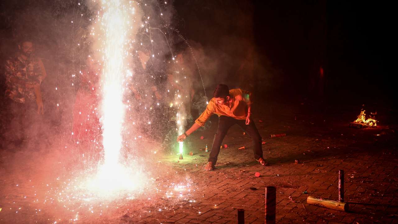 Despite bans, firecrackers sizzle across India for Diwali