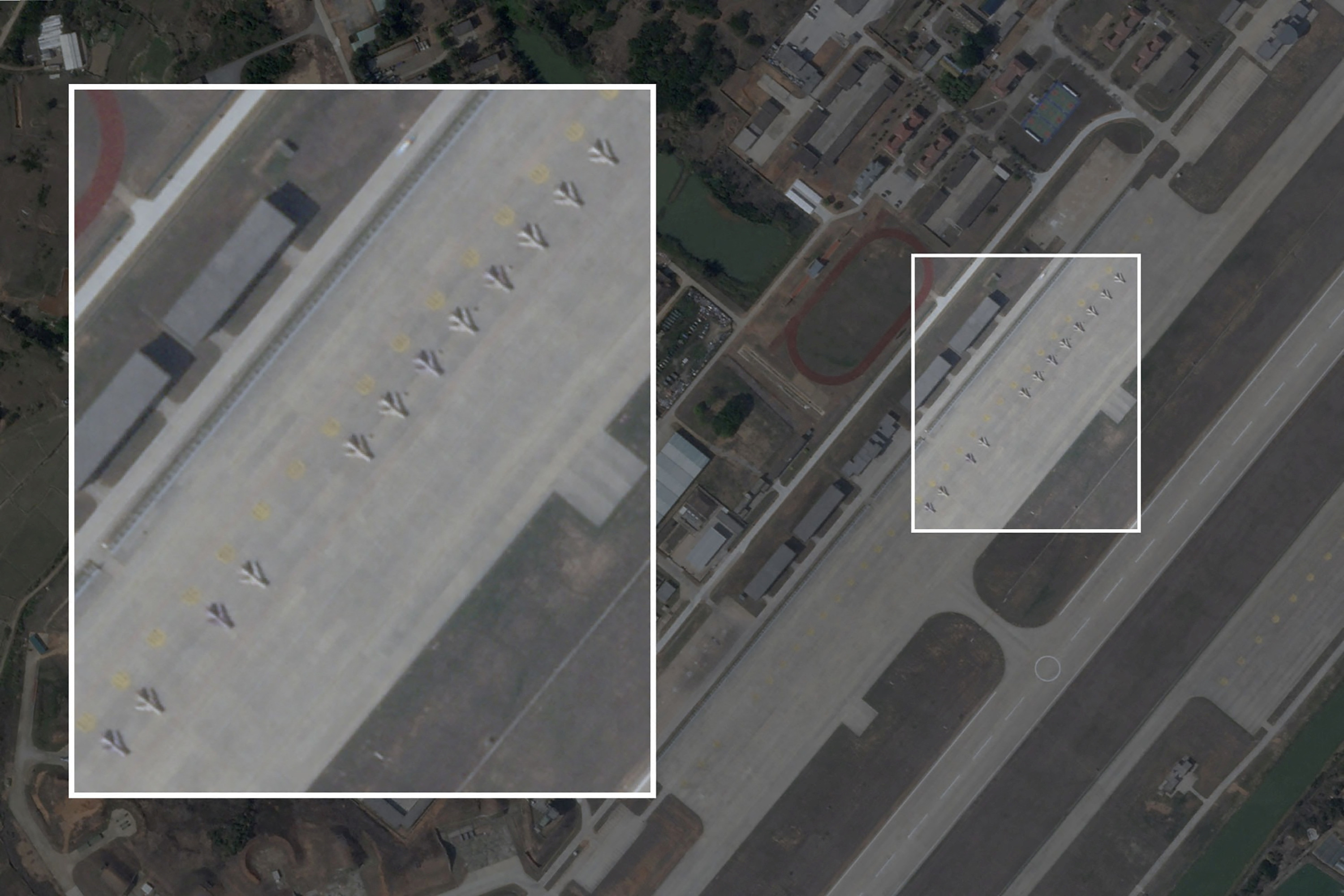 A satellite image shows obsolete J-6 fighters that have been converted into attack drones, lined up next to the runway at Longtian airbase in China's Fujian Province