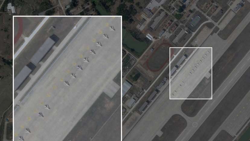 A satellite image shows obsolete J-6 fighters that have been converted into attack drones, lined up next to the runway at Longtian airbase in China's Fujian Province