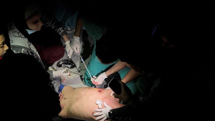 Palestinians wounded in Israeli strikes are assisted at the Indonesian hospital