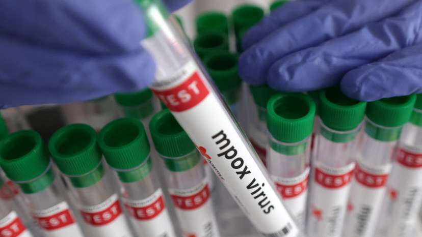 Illustration shows test tubes with "Mpox virus positive" label