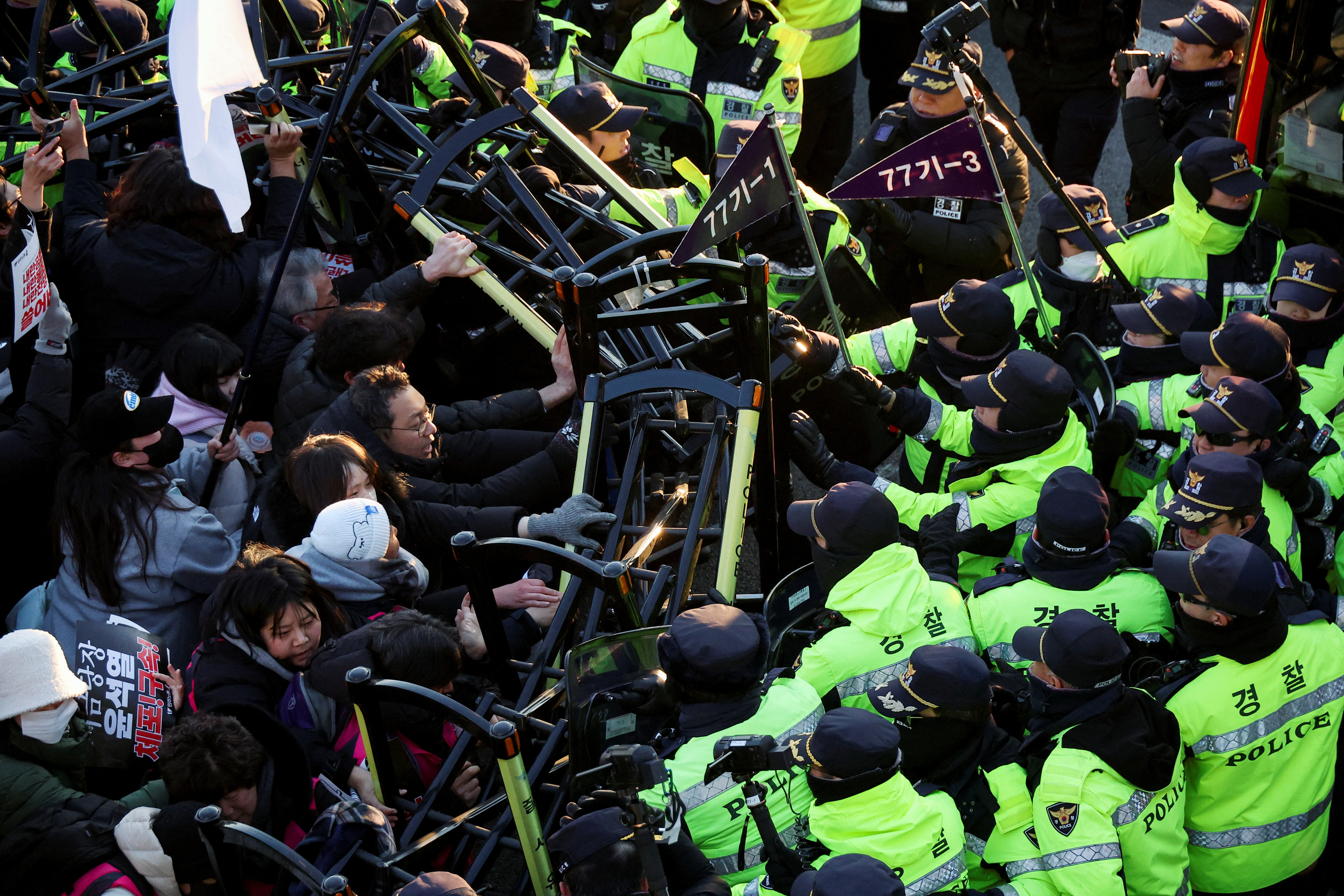 Protesters rally near impeached South Korean President Yoon's official residence, in Seoul