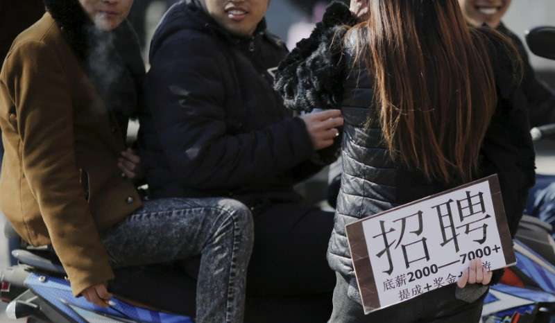 FILE PHOTO: Spotlight:China's youth face job uncertainty