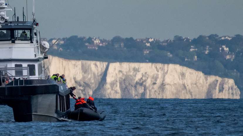 FILE PHOTO: Migrants cross the English Channel in small boats