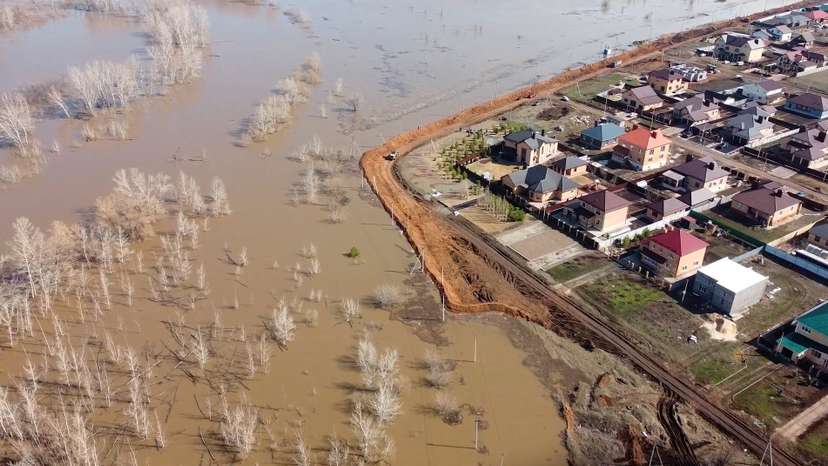 FILE PHOTO: Russian villagers build homemade dam to keep out floods, in Orenburg region