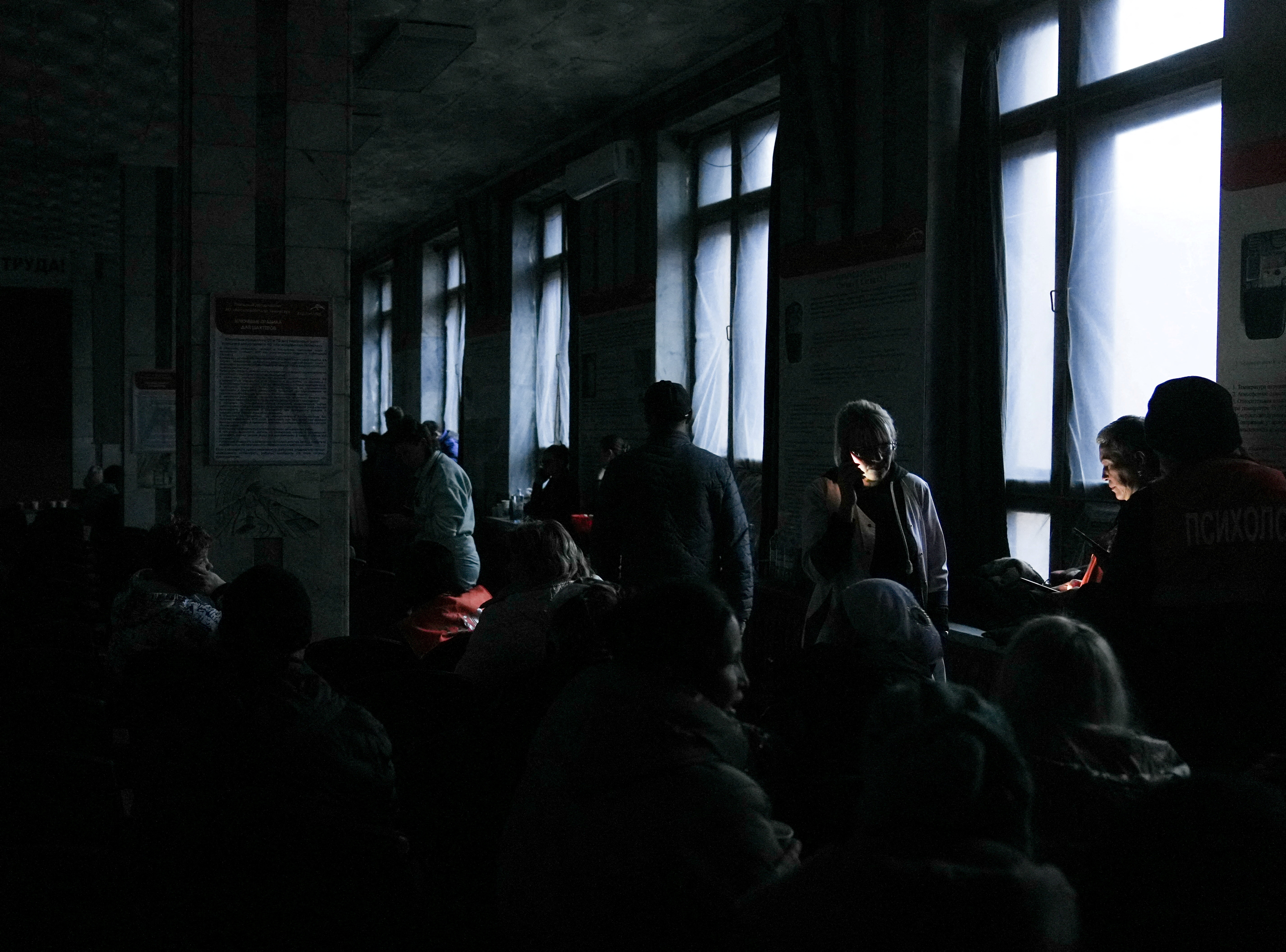Relatives of miners gather at the Kostenko coal mine in Karaganda
