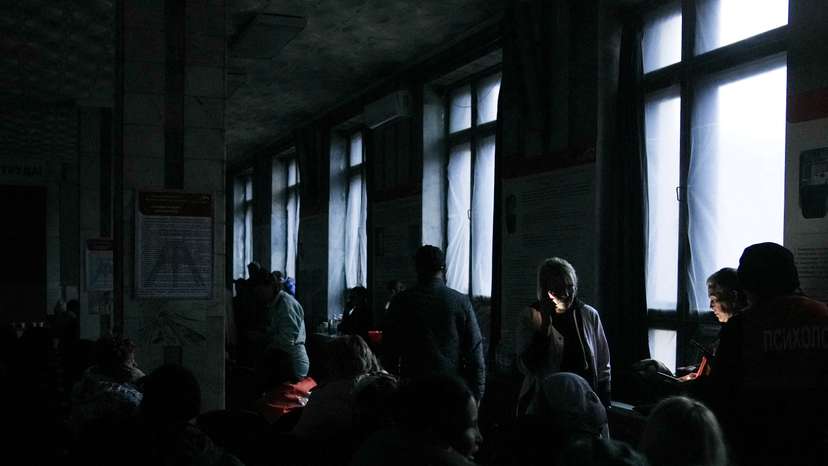 Relatives of miners gather at the Kostenko coal mine in Karaganda