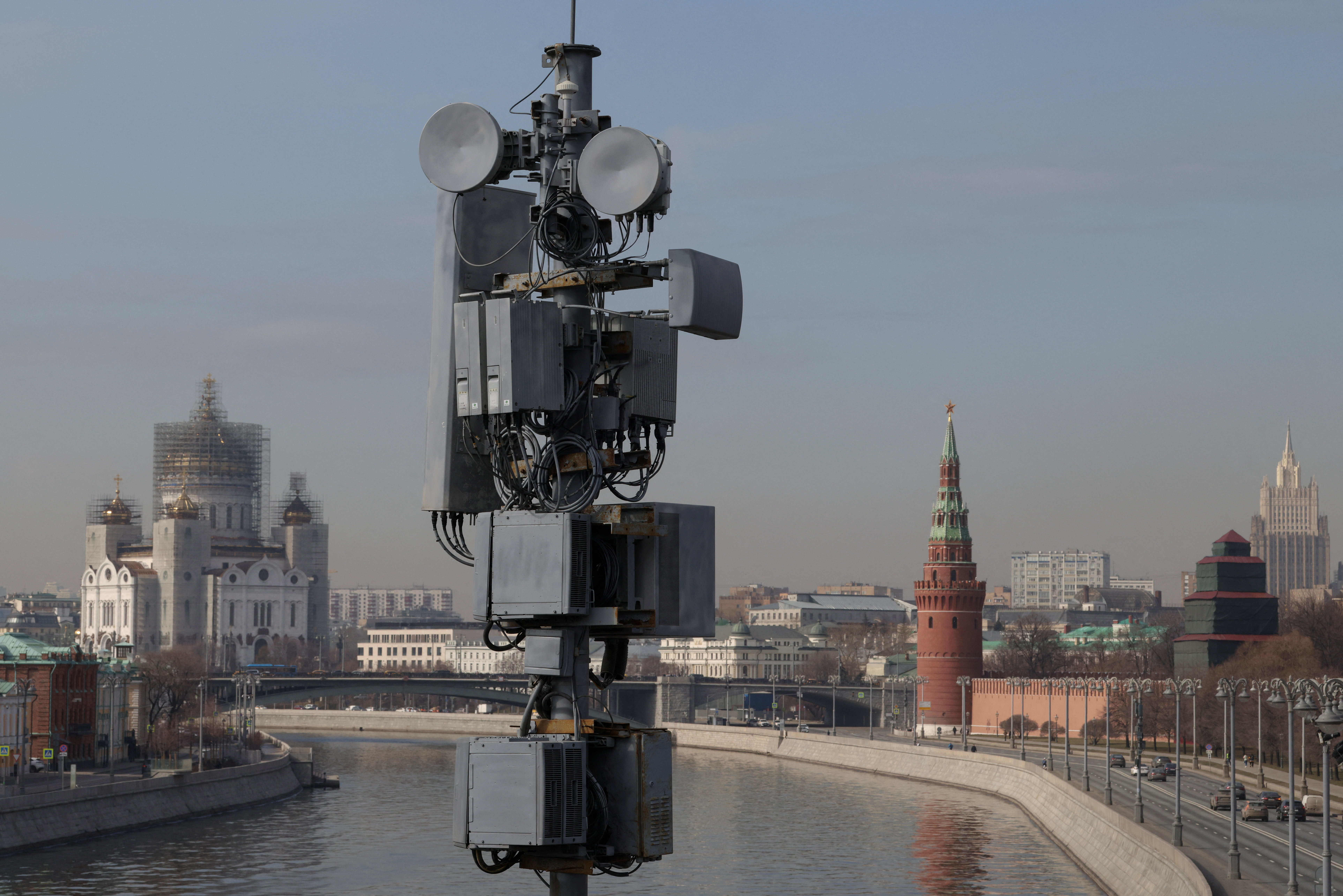A view of a cellular tower with the Christ The Savior cathedral and the Kremlin's tower in the background in central Moscow