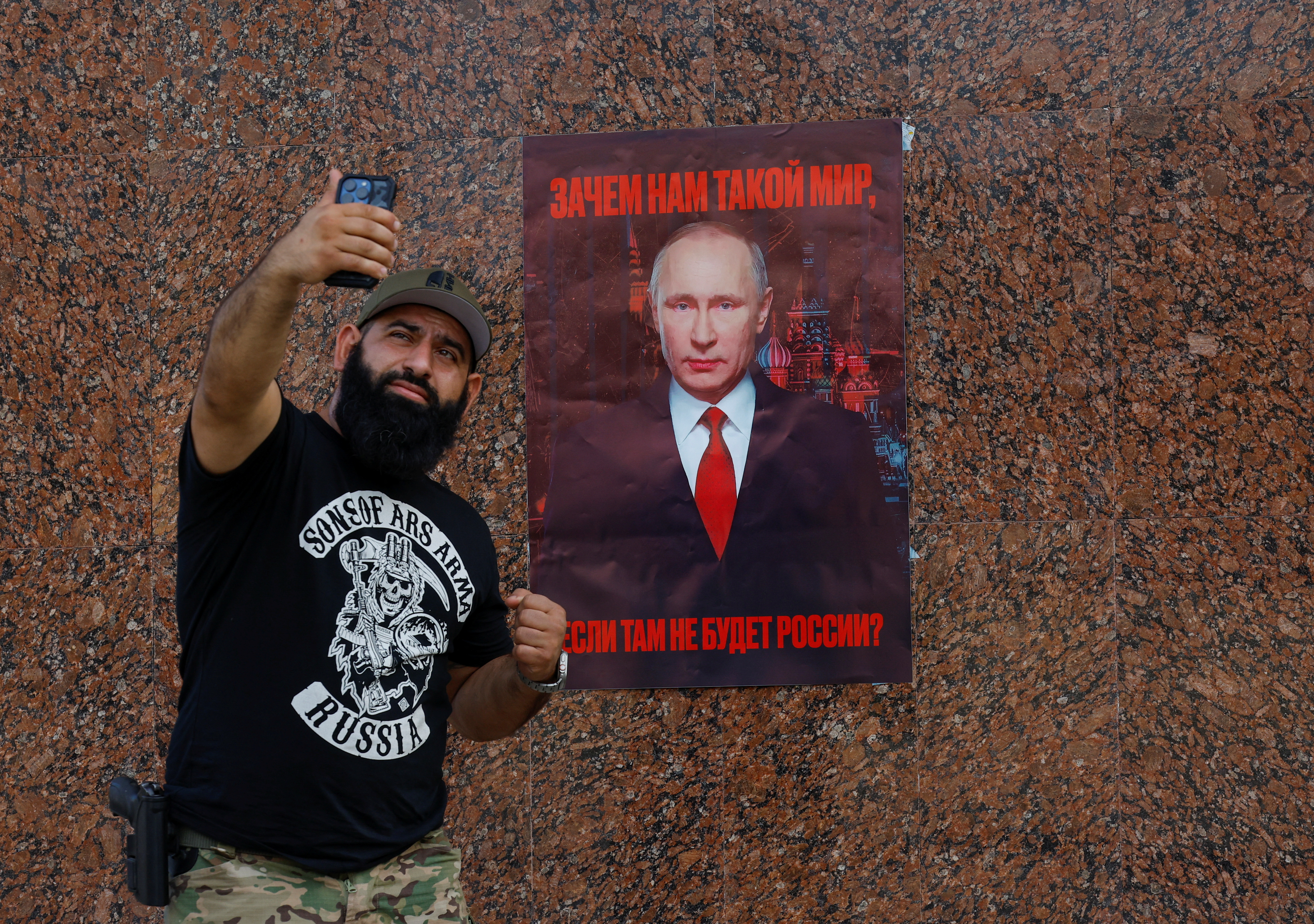 Activists mark Russian President Putin's birthday in Donetsk