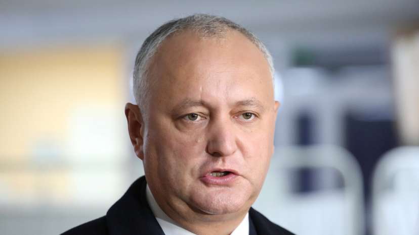 Igor Dodon, Moldova's President and presidential candidate, speaks to the media at a polling station during the second round of a presidential election in Chisinau