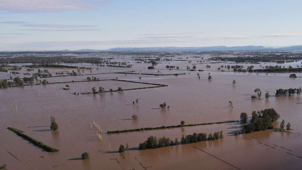 A drone view shows a flooded area near the Hunter River in Heatherbrae
