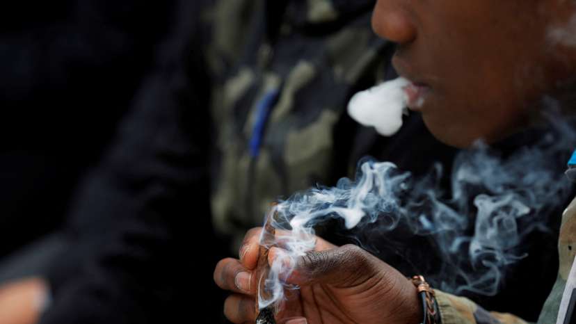 FILE PHOTO: People smoke marijuana on the informal cannabis holiday, 4/20, in Boston