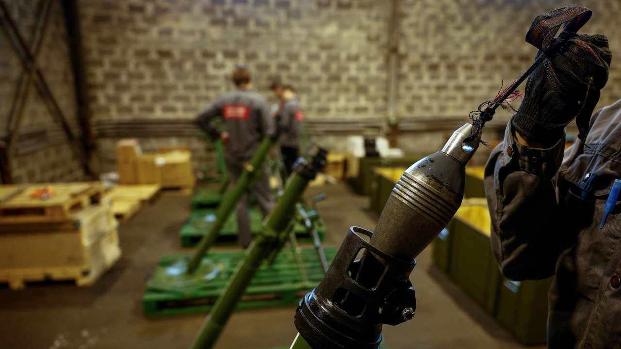 Employee checks a mortar at a production facility of the 'Ukrainian Armor' company in Ukraine