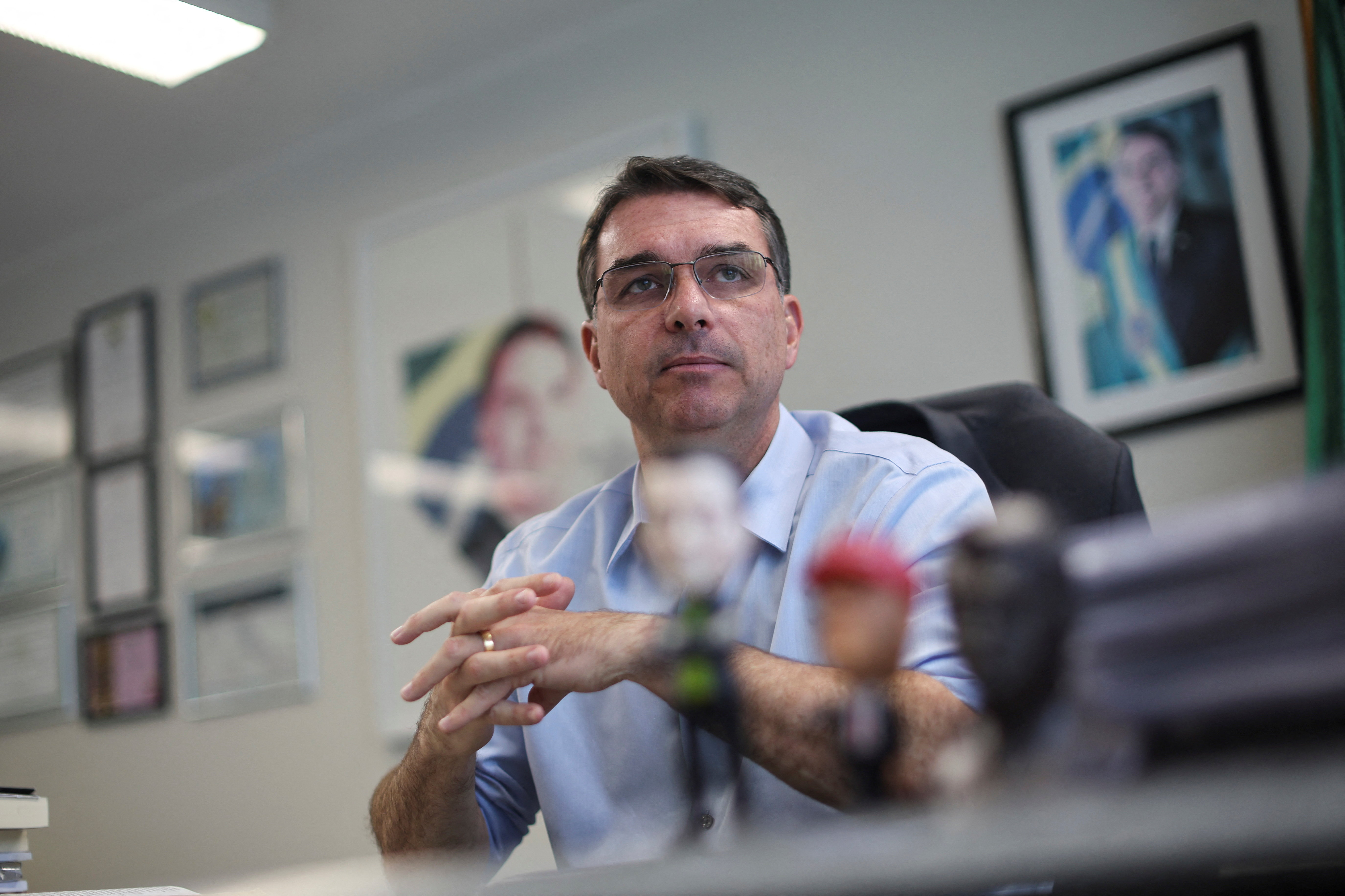 Senator Flavio Bolsonaro, son of Brazil's former President Jair Bolsonaro, attends an interview with Reuters