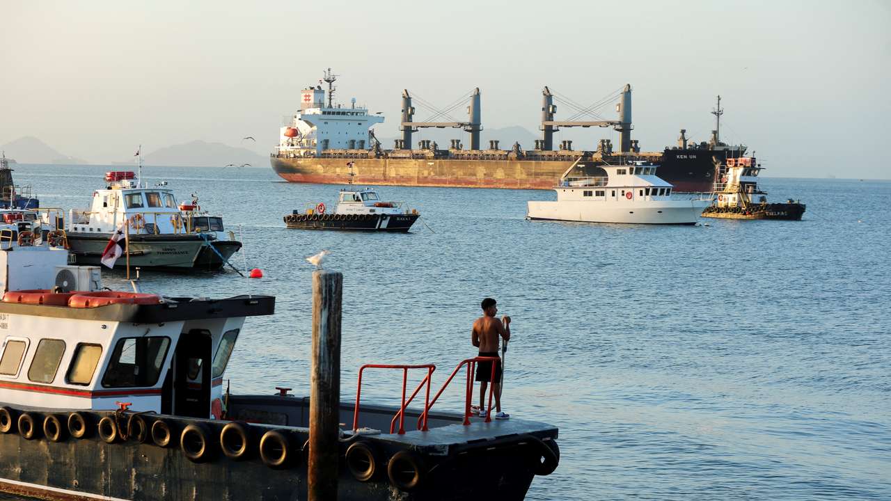 Cargo ship sails at the entrance to the Panama Canal