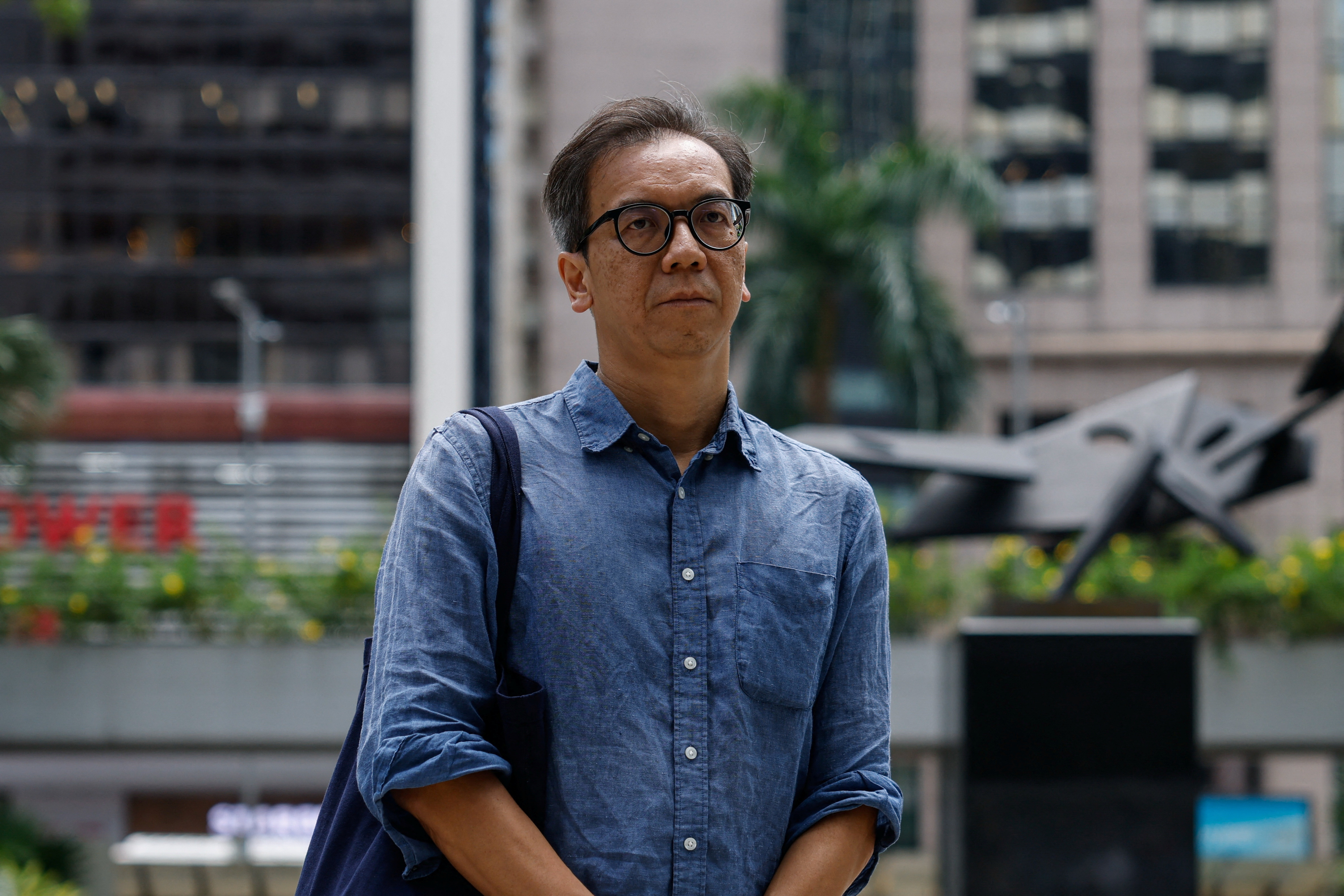 Chung Pui-kuen, former chief editor of the Stand News, arrives at the District Court in Hong Kong