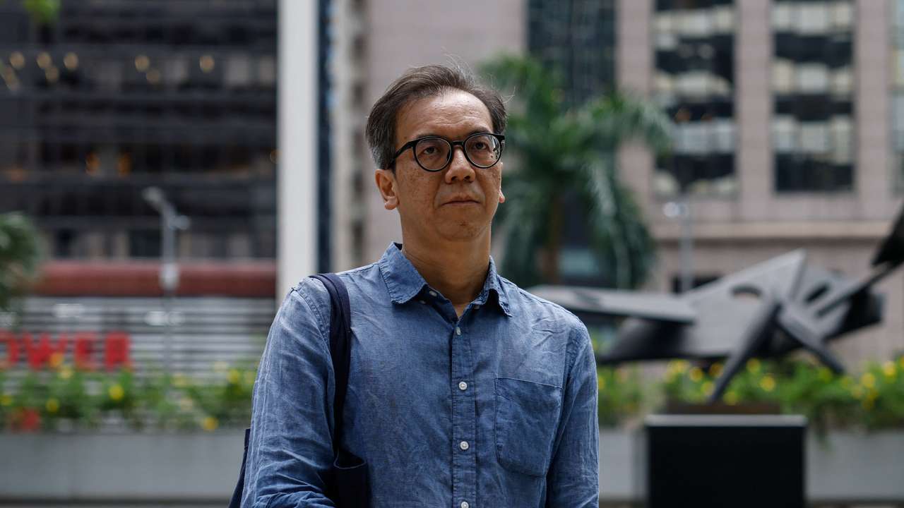 Chung Pui-kuen, former chief editor of the Stand News, arrives at the District Court in Hong Kong