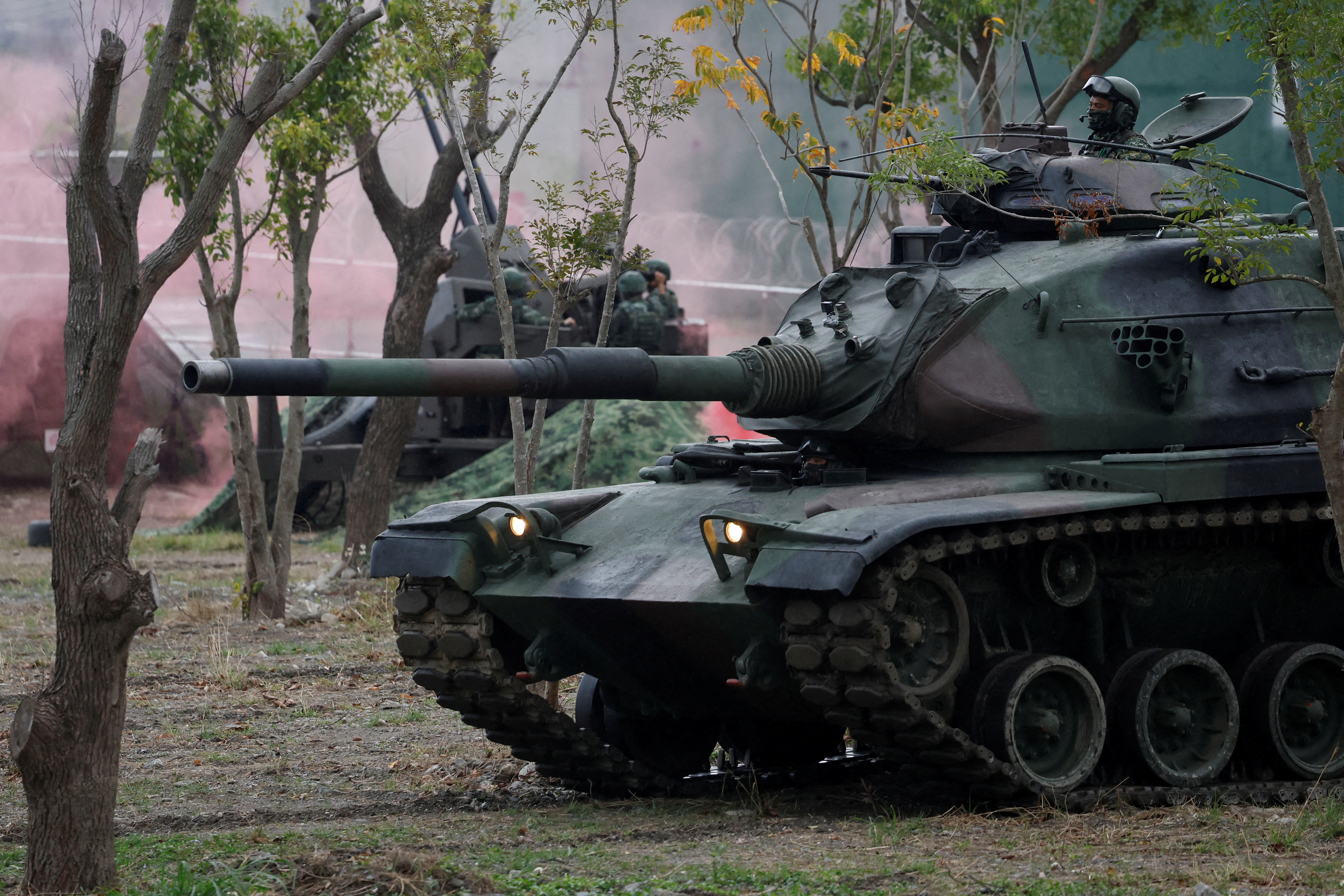 Members of Taiwan’s armed forces participate in a drill as part of a demonstration for the media at a military base in Taitung