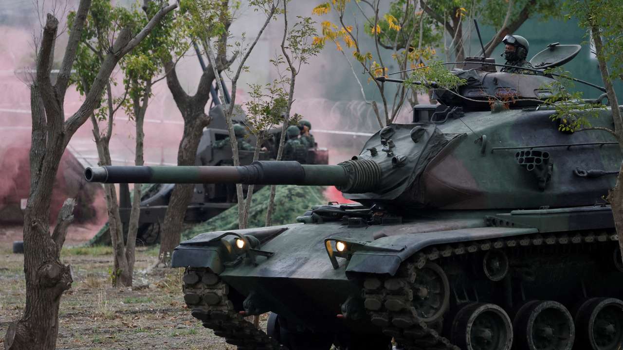 Members of Taiwan’s armed forces participate in a drill as part of a demonstration for the media at a military base in Taitung