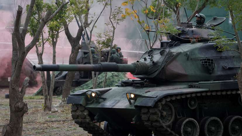 Members of Taiwan’s armed forces participate in a drill as part of a demonstration for the media at a military base in Taitung