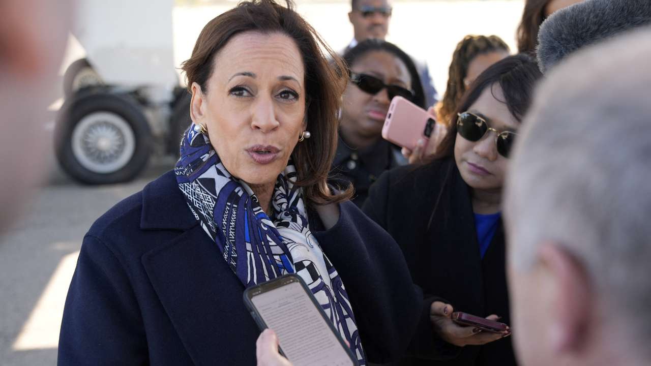 Democratic presidential nominee U.S. Vice President Kamala Harris speaks to the media before boarding Air Force Two on departure from Detroit