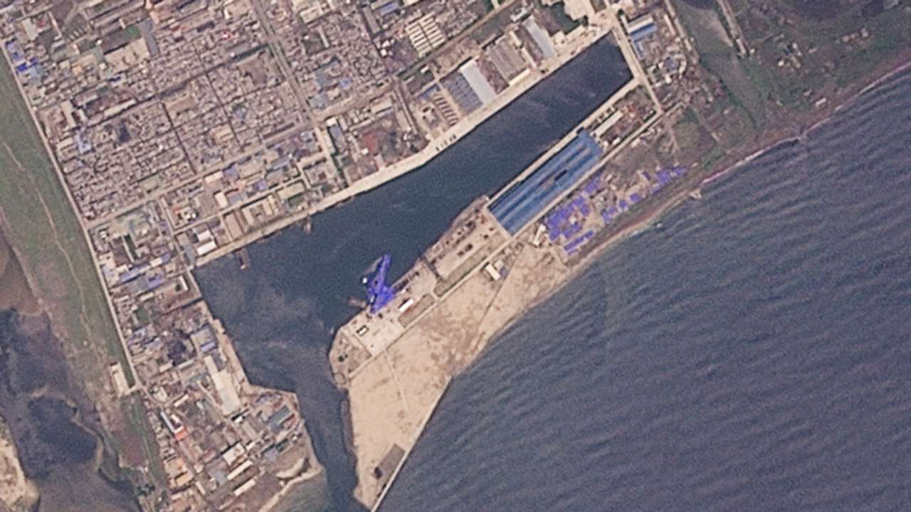 A satellite image shows the North Korean warship in water at shipyard after the launch accident