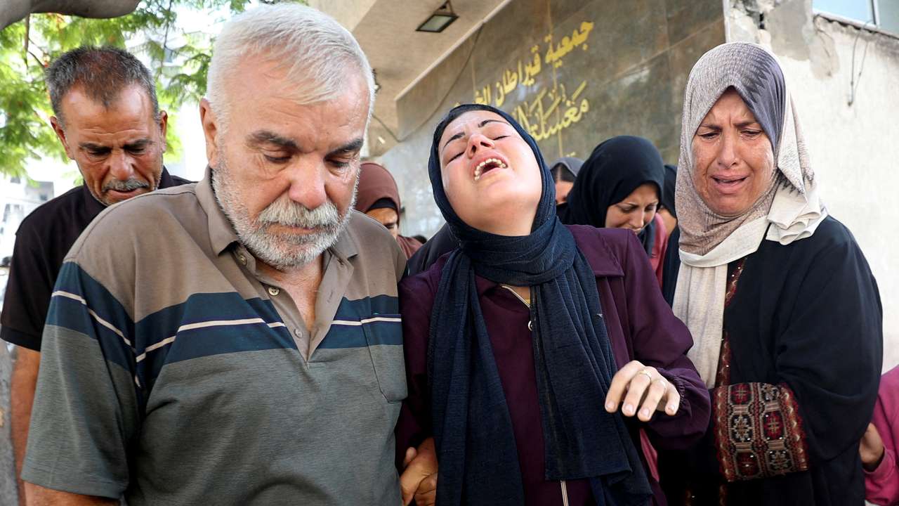 FILE PHOTO: Funeral of Palestinians who were killed by Israeli fire while trying to receive aid in central Gaza Strip, according to the Gaza Health Ministry, at Al-Shifa hospital