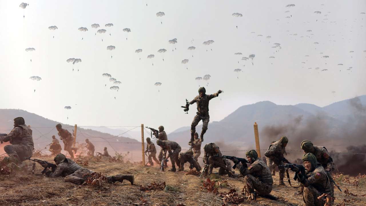 North Korean leader Kim Jong Un guides the training of the Korean People's Army's air and amphibious combat units